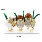Three Jeweled Chicks in Grass Brooch