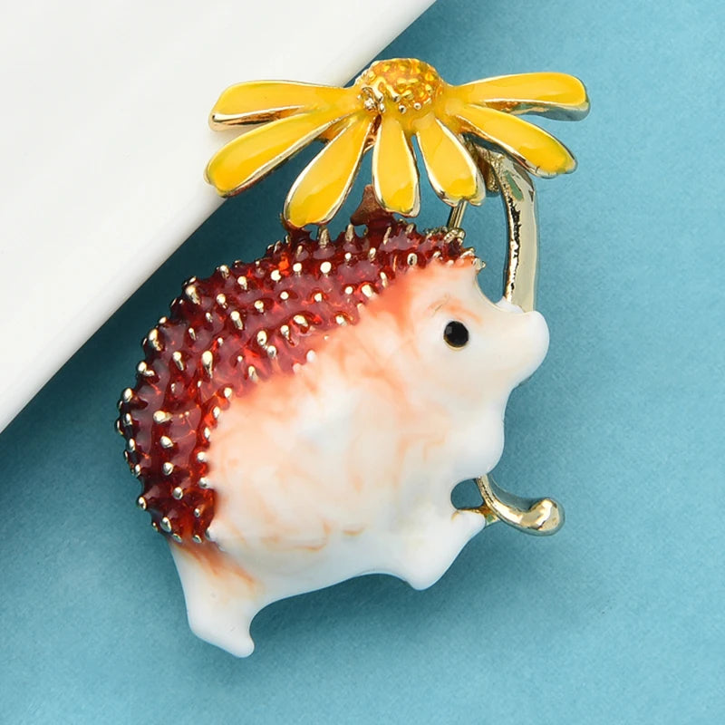 Hedgehog Holding Daisy Flower Brooch