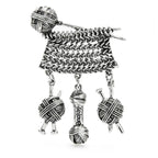 Knitting Needles with Dangling Yarn Balls Brooch — Antique Silver