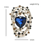 Jeweled Spiral Oval Brooch