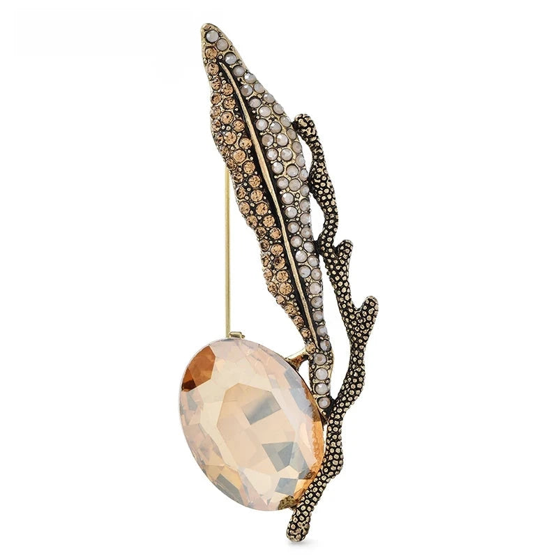 Jeweled Feather with Faceted Drop Brooch — Champagne