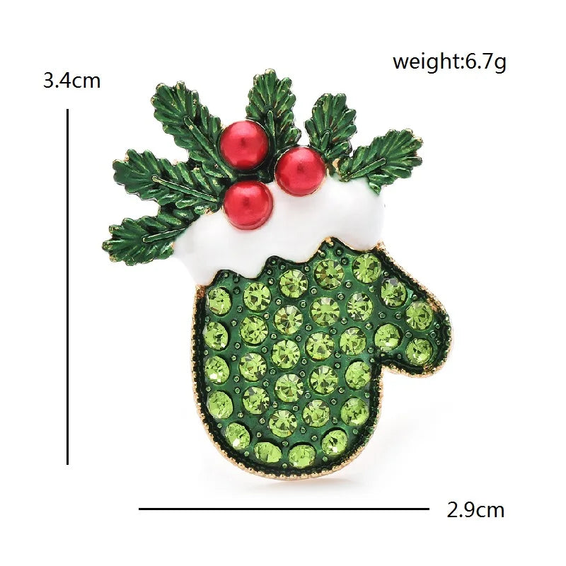 Broche moufle de Noël avec houx et strass