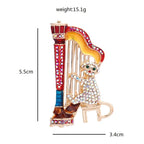 Jeweled Cat Playing a Harp Brooch