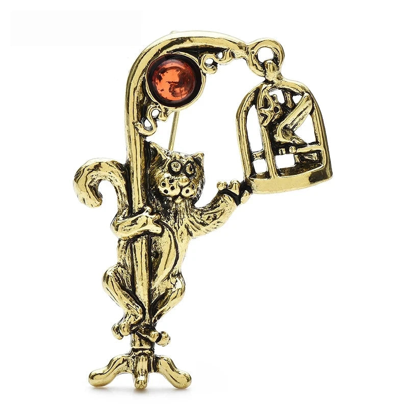 Vintage-Style Cat Reaching for a Birdcage Brooch — Gold