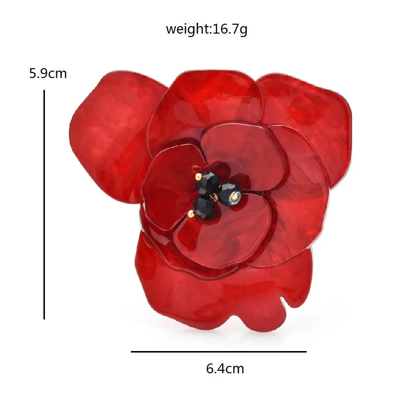 Broche fleur en acrylique superposé avec centre en perle noire