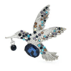 Faceted Hummingbird in Flight Brooch — Blue