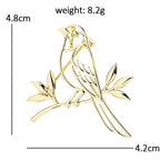 Openwork Magpie on Leafy Branch Brooch