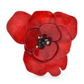 Broche fleur en acrylique superposé avec centre en perle noire