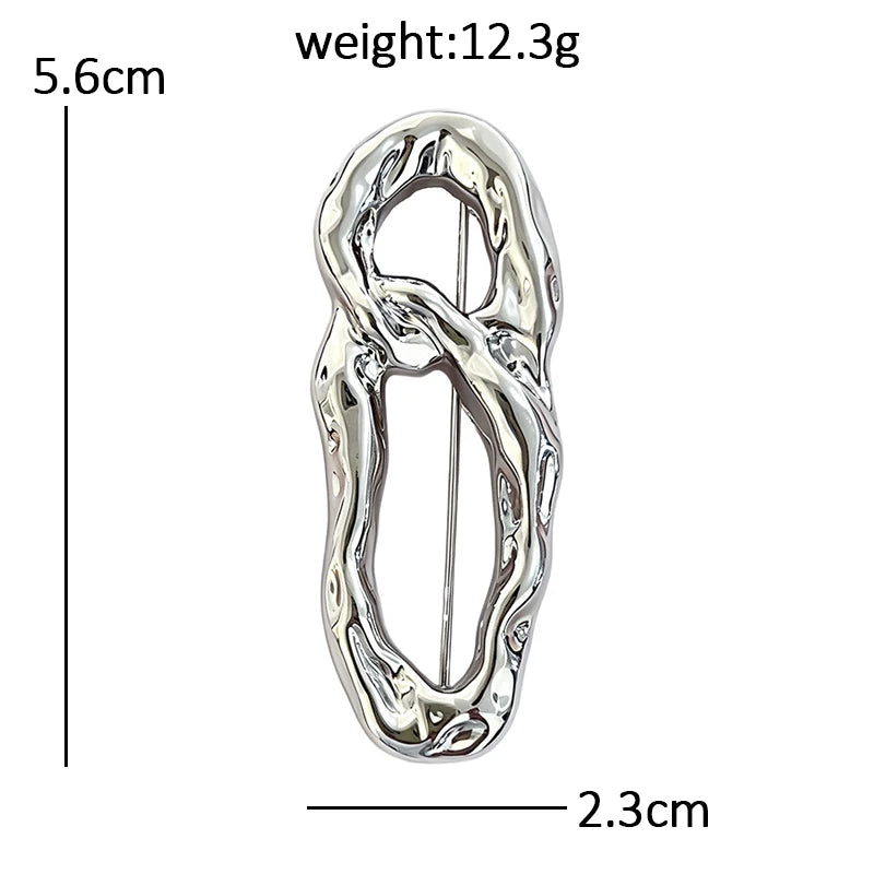 Textured Openwork Figure Eight Brooch