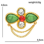 Faceted Floral Cross with Draped Chains Brooch — dimensions