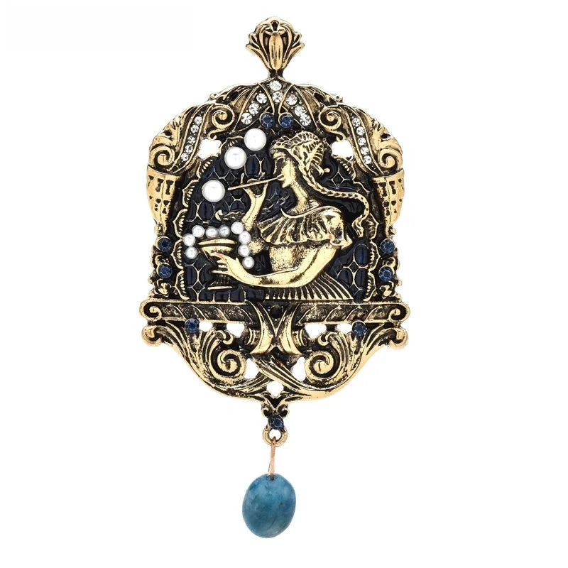 Art Nouveau Woman Blowing Bubbles with Blue Drop Brooch — Woman & Bubbles
