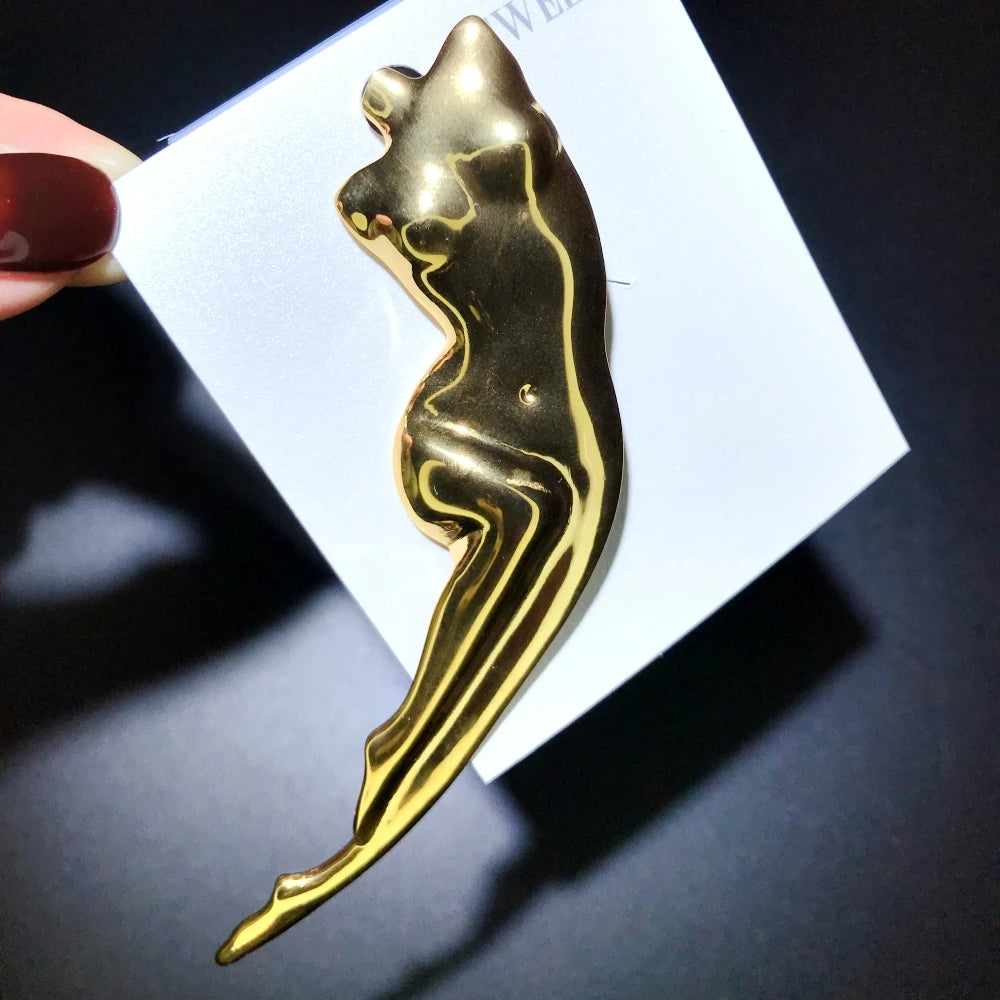 Broche silhouette féminine abstraite fluide