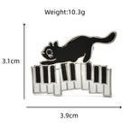 Enamel Cat on Piano Keys Brooch dimensions and weight