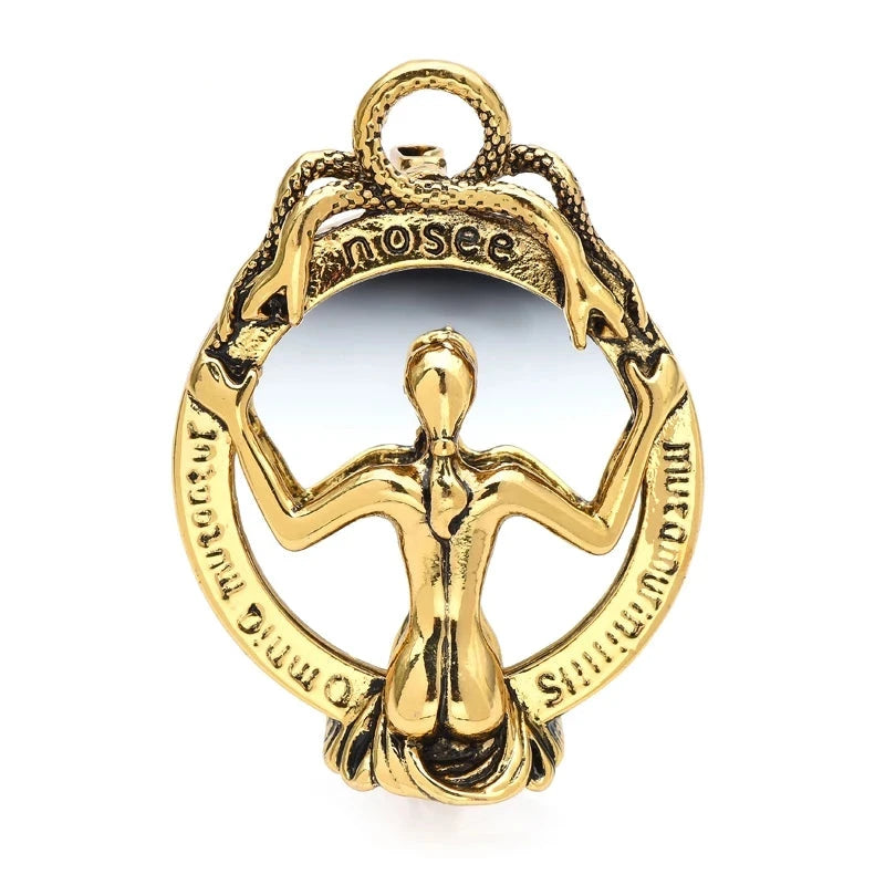Woman in Ornate Mirror Frame Brooch — Gold