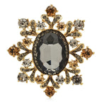 Ornate Oval Faceted Stone Brooch — Gray