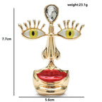 Surreal Face with Yellow Eyes and Red Lips Brooch — dimensions