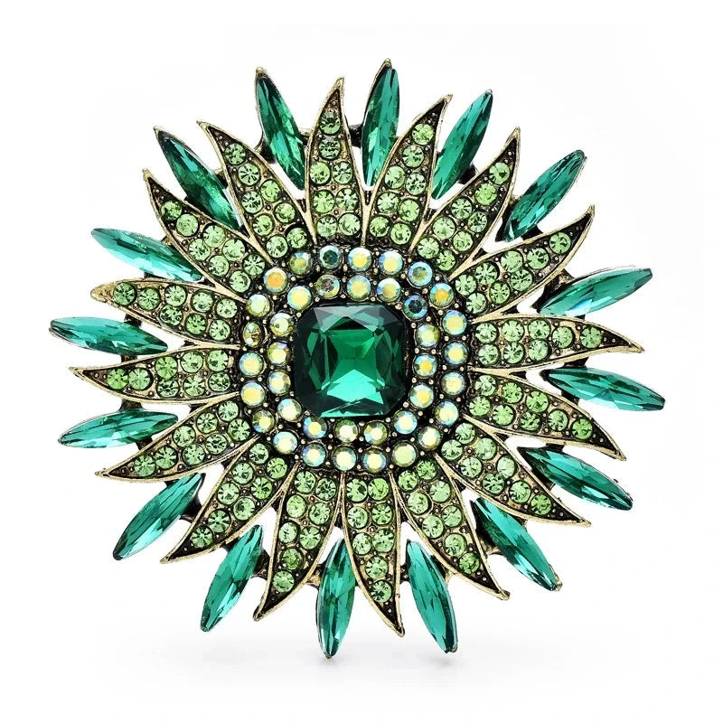 Radiant Rhinestone Sunburst Brooch — Green