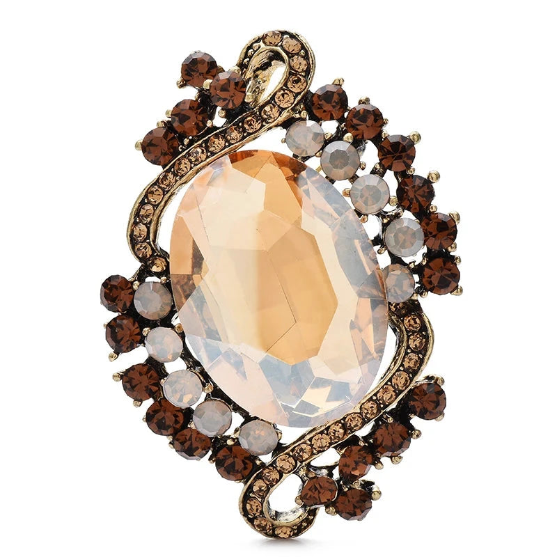 Vintage-Style Faceted Oval with Ribbon Frame Brooch — Champagne