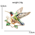 Hummingbird Hovering over a Flower Brooch