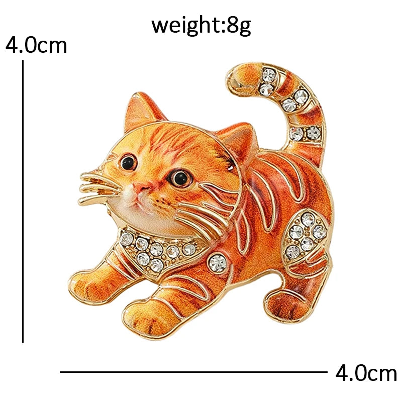 Broche chaton accroupi espiègle