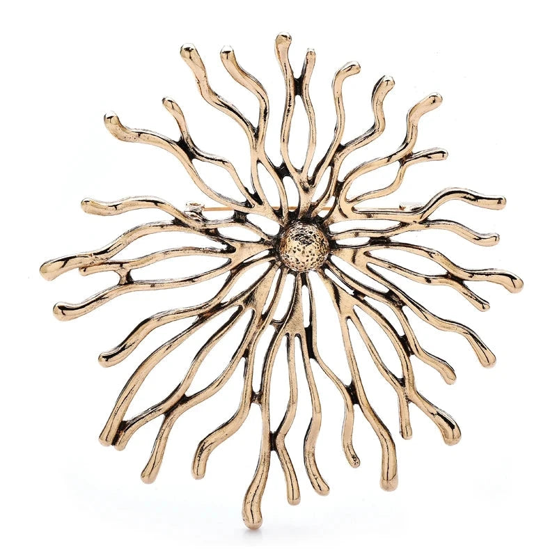 Sculptural Sunburst with Rhinestone Center Brooch — Gold