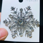 Broche flocon de neige à six branches ornée de joyaux