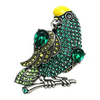 Vintage Rhinestone Parrot on Branch Brooch original white background product photo