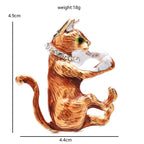 Orange Cat Grooming Its Paw Brooch — dimensions
