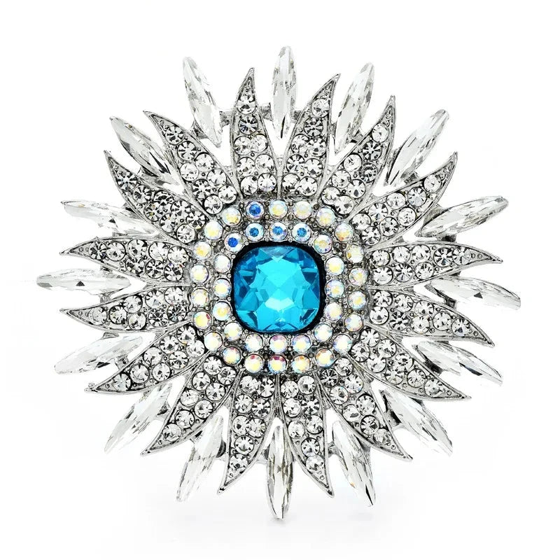 Radiant Rhinestone Sunburst Brooch — Silver & Aqua