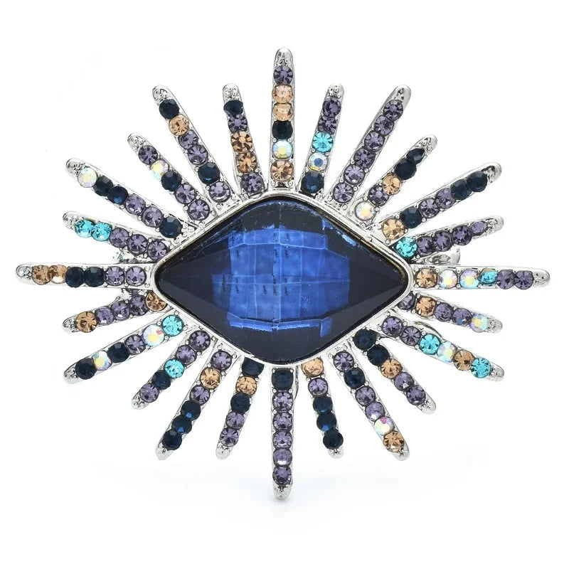 Faceted Eye with Radiating Rhinestone Rays Brooch — Blue