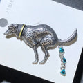 Playful Dog with Dangling Blue Crystals Brooch