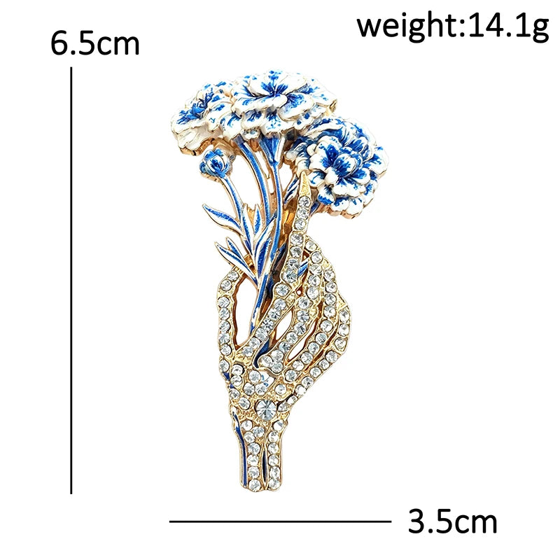 Skeleton Hand Holding Flower Bouquet Brooch