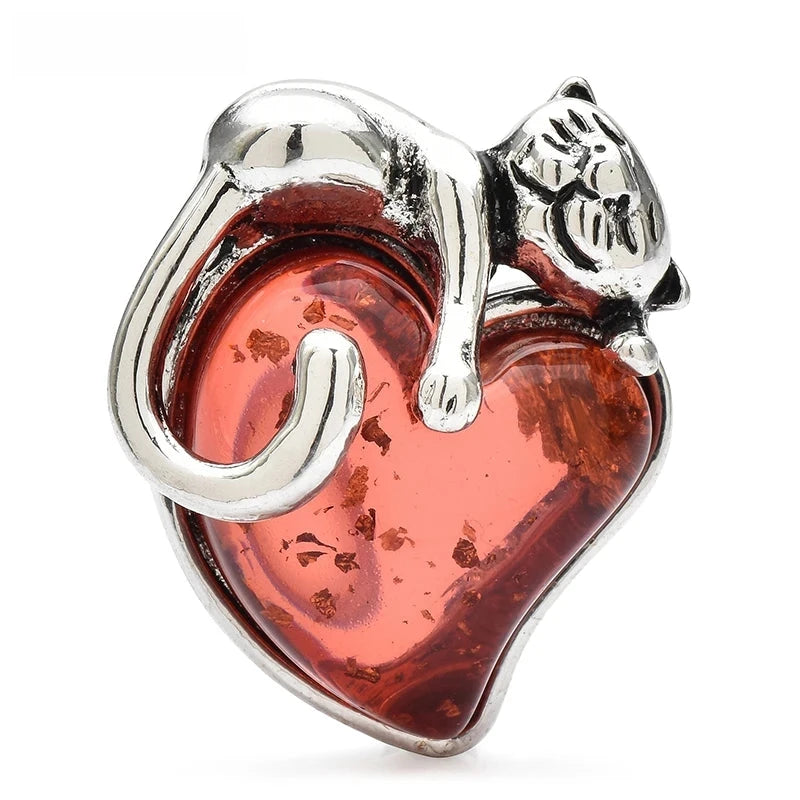 Cat Curled Around a Heart Brooch — Silver