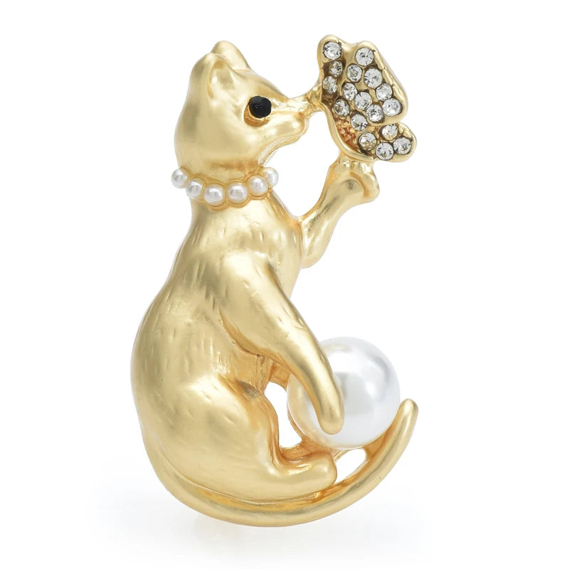 Cat Holding Jeweled Butterfly Brooch