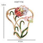 Jeweled Nature and Symbol Motif Brooch