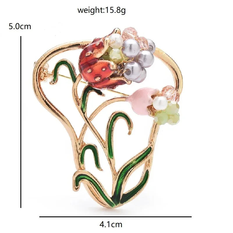 Jeweled Nature and Symbol Motif Brooch