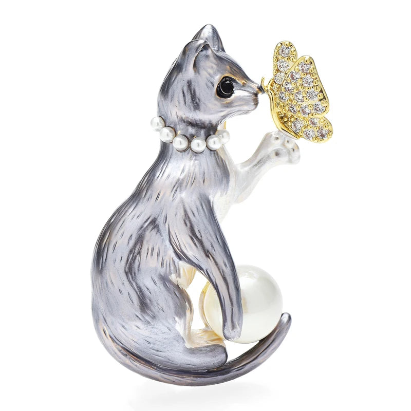 Cat Holding Jeweled Butterfly Brooch