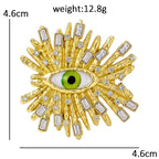 Sparkling Eye Sunburst Brooch