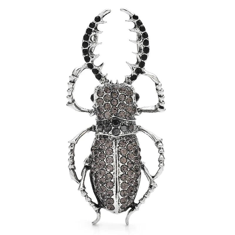 Grande broche scarabée ornée de bijoux