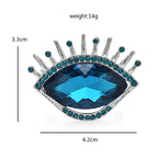 Faceted Crystal Eye Brooch
