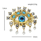 Jeweled Eye with Pearl-Look Drops Brooch