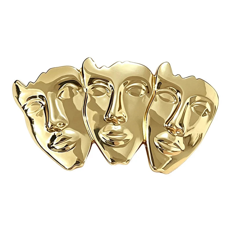 Sculptural Trio of Faces Brooch