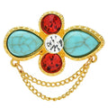 Faceted Floral Cross with Draped Chains Brooch — Blue