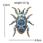 Blue and White Floral Beetle Brooch