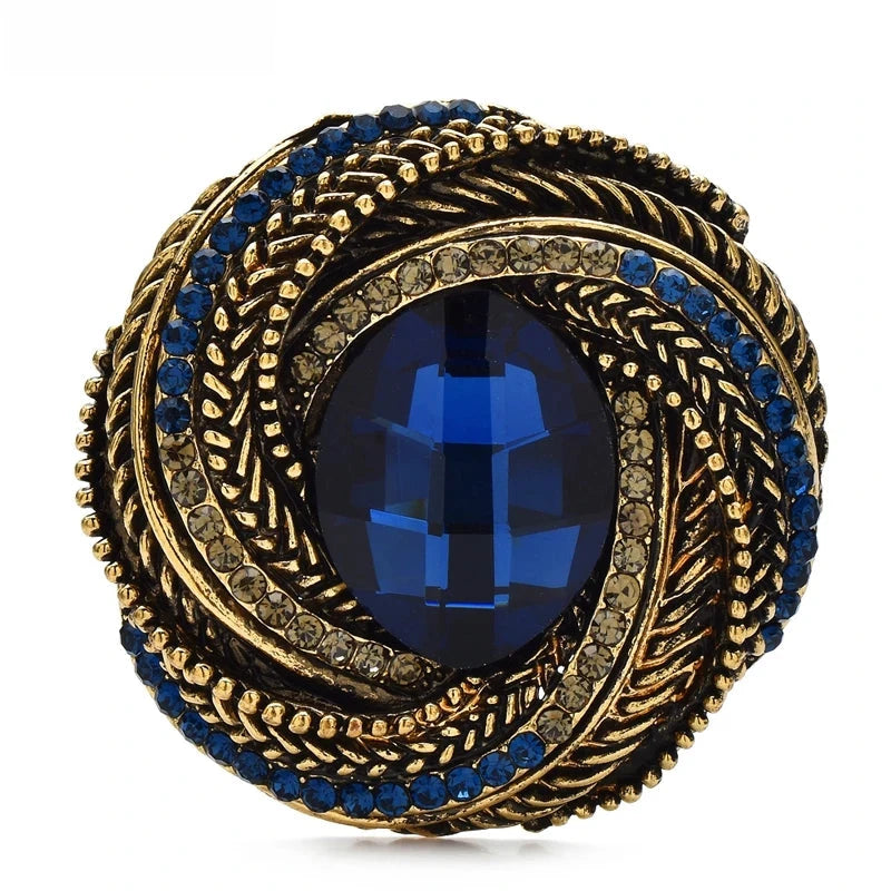 Vintage-Style Faceted Oval with Braided Frame Brooch — Blue