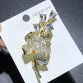 Crystal Plum Blossom Sprig Brooch — Gold