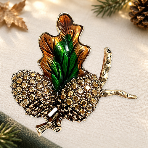 Autumn Pinecone and Leaf Brooch on an ivory themed backdrop