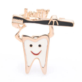 Smiling Tooth and Toothbrush Brooch