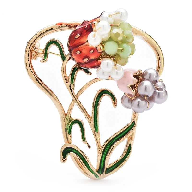 Jeweled Nature and Symbol Motif Brooch