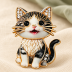 Smiling Seated Kitten Sparkle Brooch — styled background